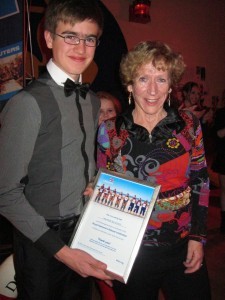 Irene Devitt of the RNLI presents certificate of gratitude to the Watch Leaders
